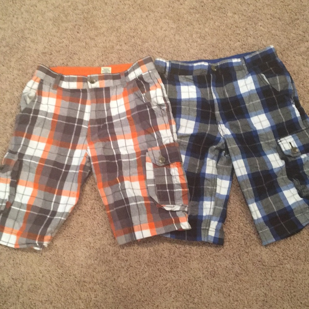 Two pair of plaid boys shorts